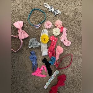 Bundle of baby headbands and clips